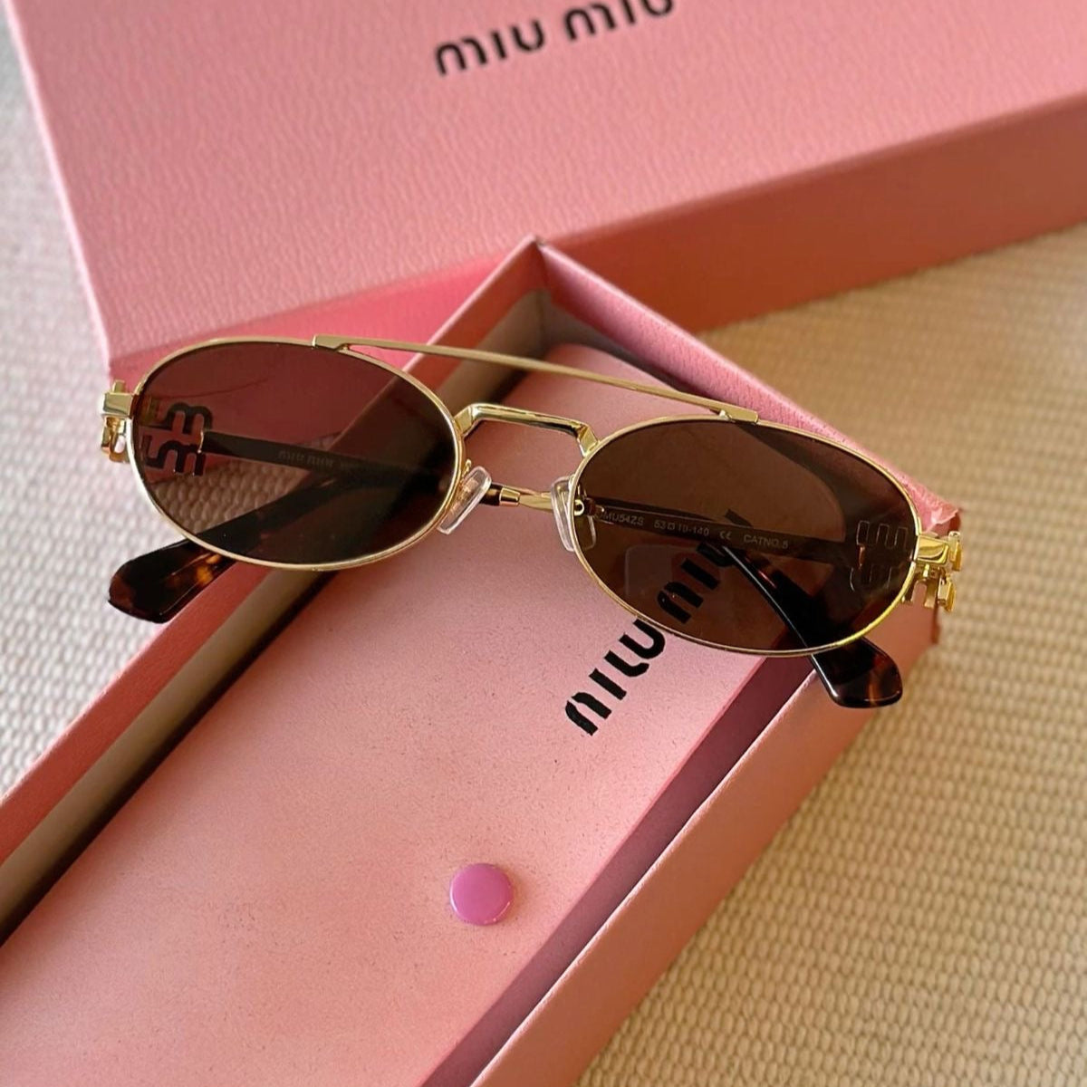 Óculos de Sol Miu Miu Travel