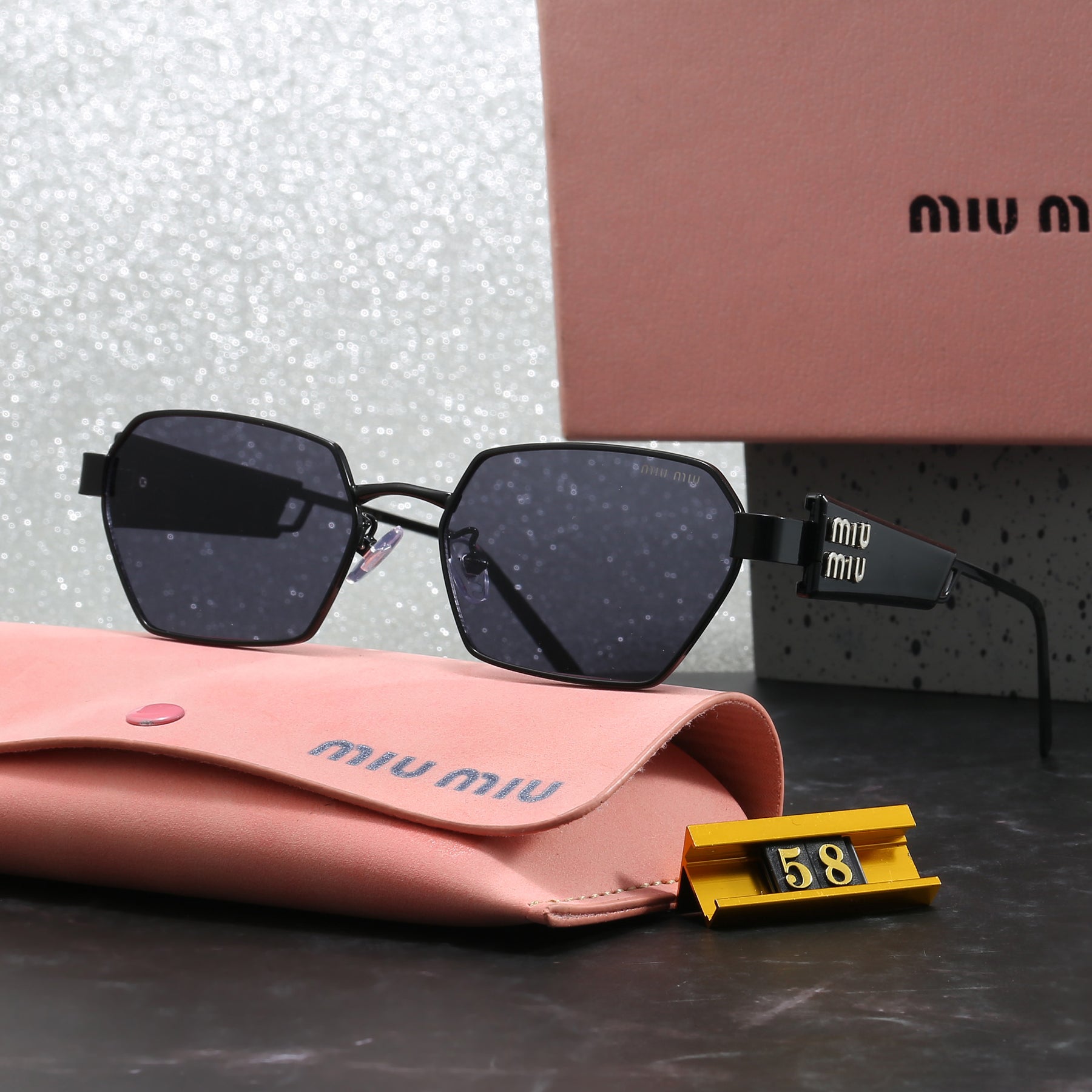 Óculos de Sol Miu Miu Milano