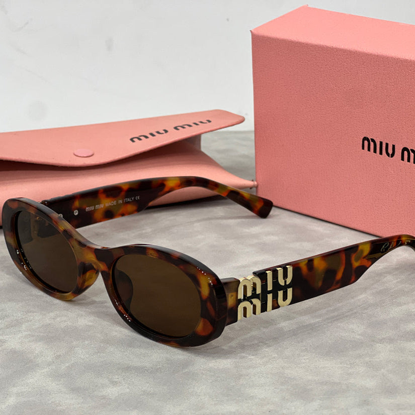 Óculos de Sol Miu MIu 06ZS