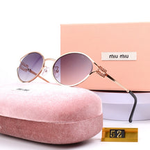 Óculos de Sol Miu Miu Solar