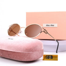 Óculos de Sol Miu Miu Solar