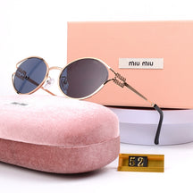 Óculos de Sol Miu Miu Solar